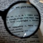 This is a magnifying glass focused on the word, copyright in a book.