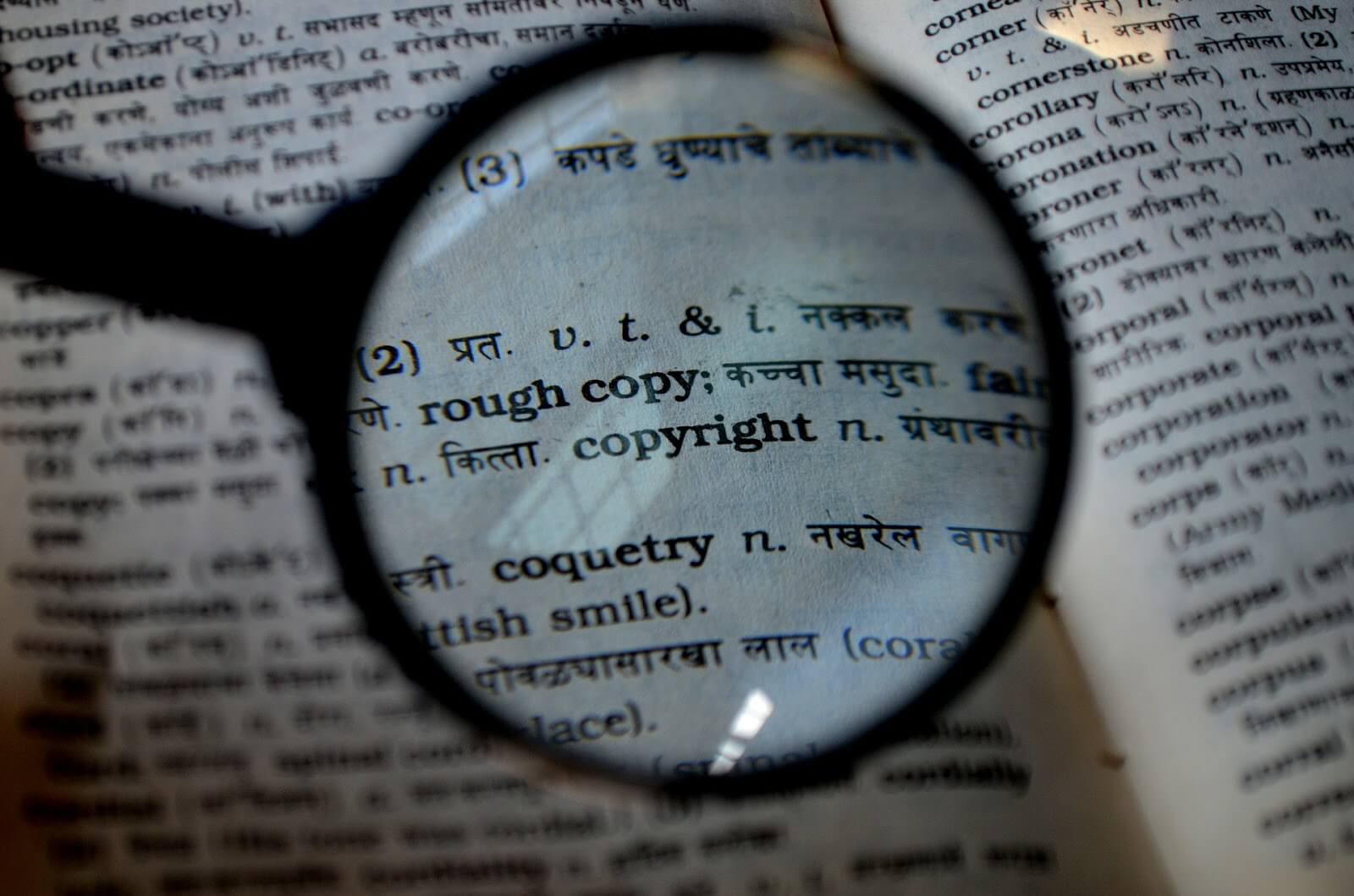 This is a magnifying glass focused on the word, copyright in a book.
