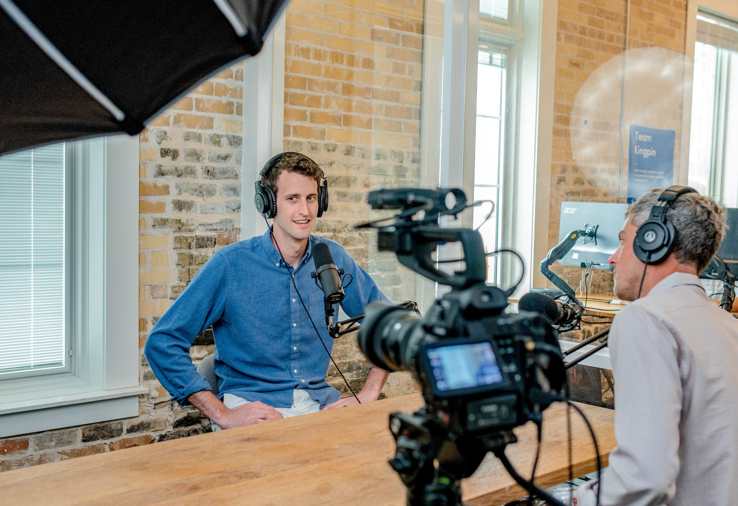 Two men shooting a video marketing ad