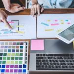 multiple items on a desk reflecting the importance of branding consistency for a business